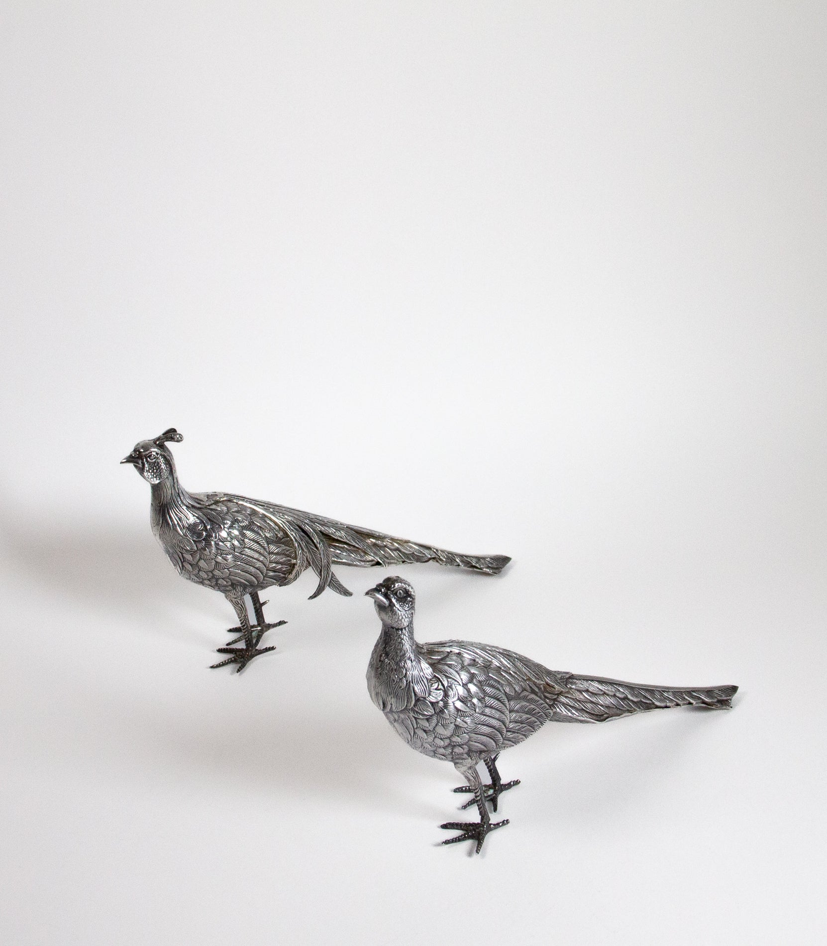 PAREJA DE FAISANES ANTIGUOS DE PLATA